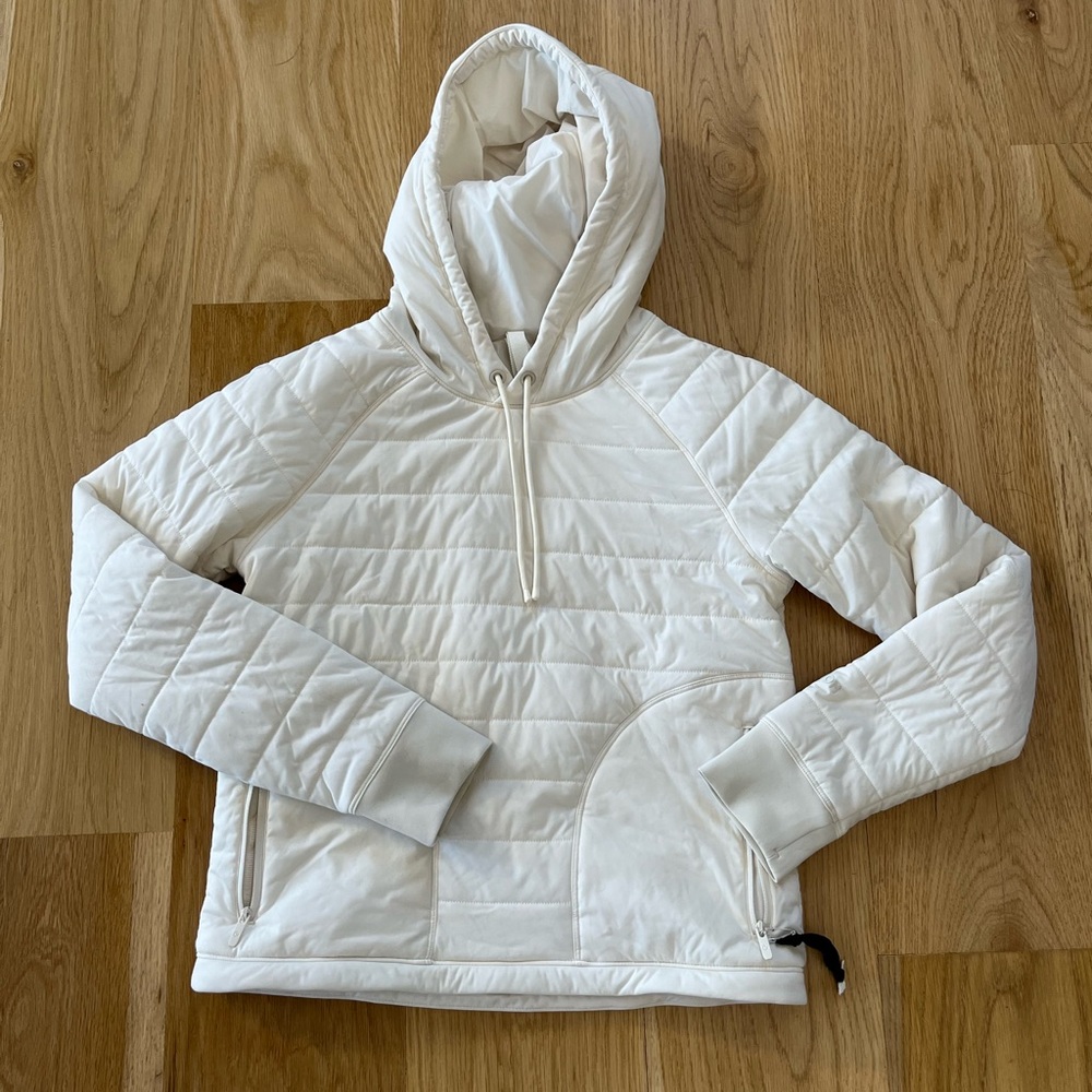 NWOT!  Never worn!  Cream Lululemon quilted sweatshirt with hood.  Size 4.
